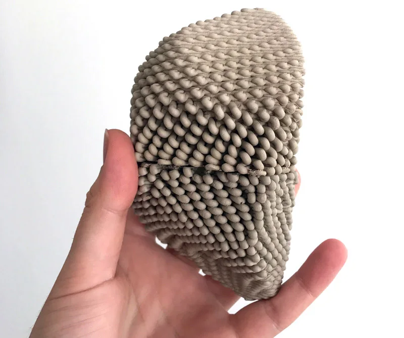 A printed stone in the hand